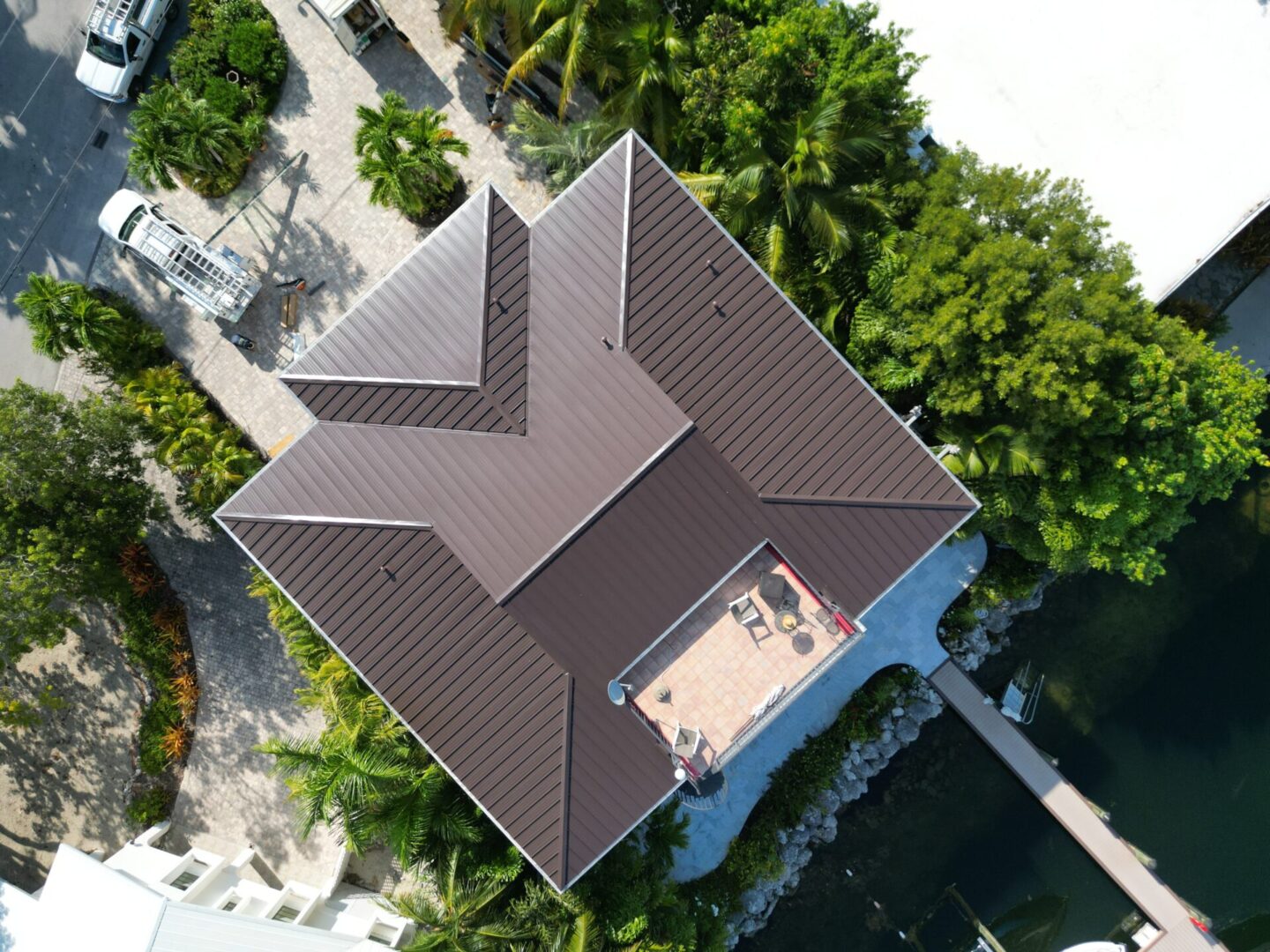 A top view of a house showing its brown roof
