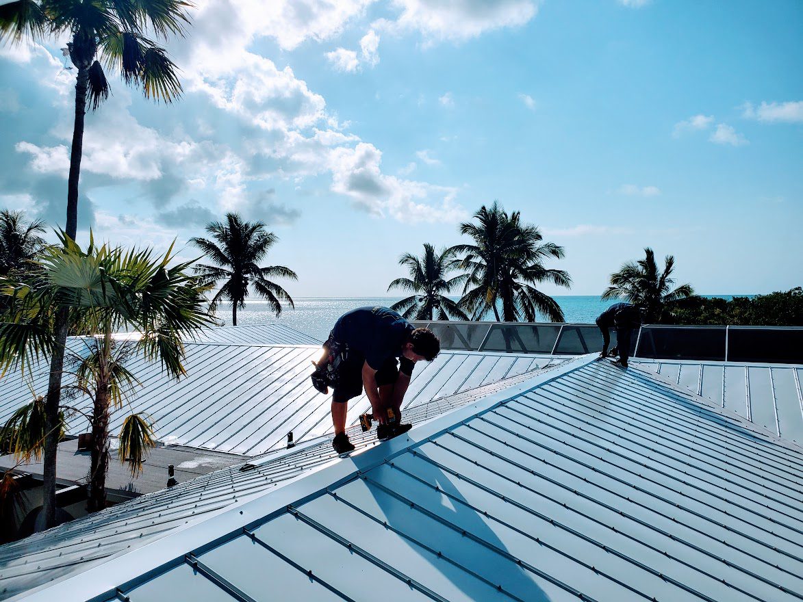 A man installing a roof