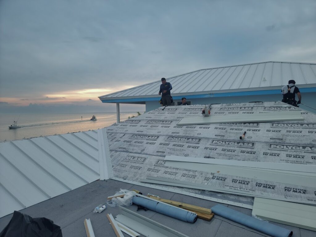 Roof installation with underlayment on coastal home near water